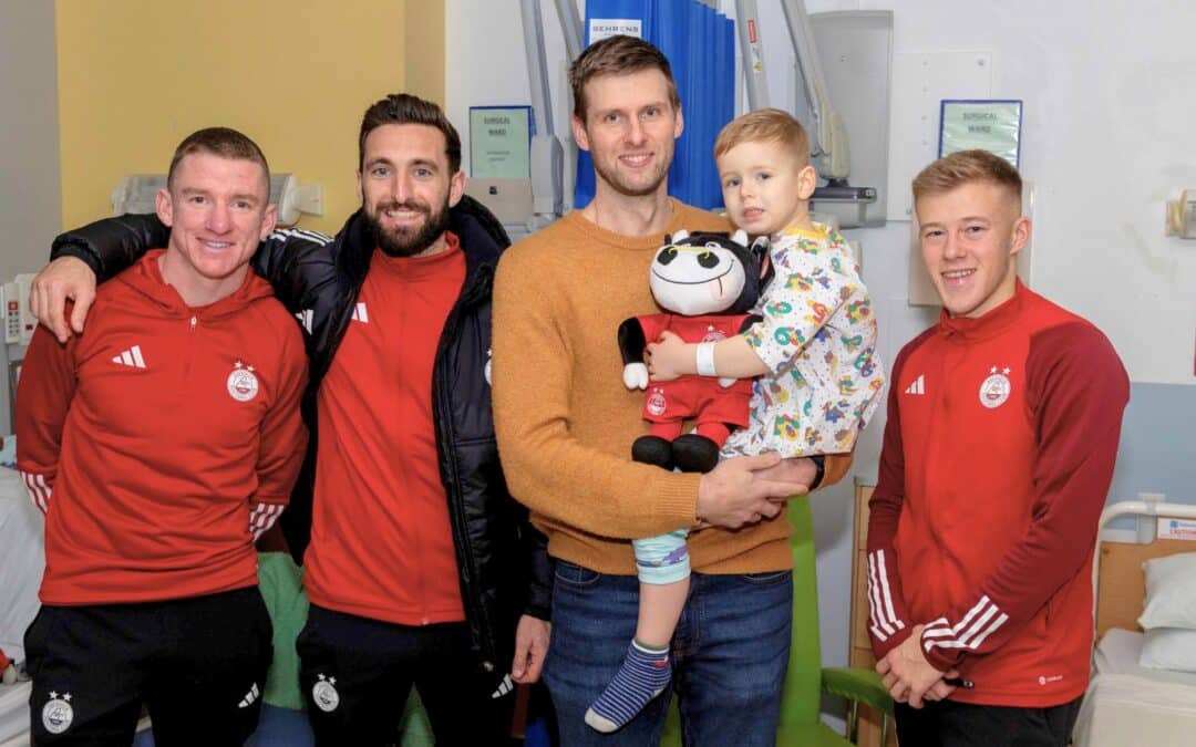 Footballers kick sadness into touch: Dons heroes bring festive cheer to young patients at children’s hospital